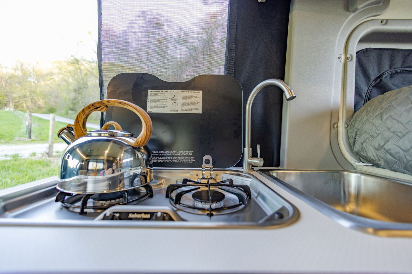 see the compact kitchen