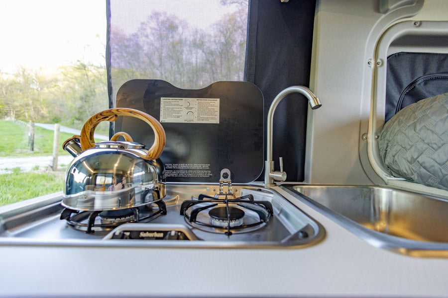see the compact kitchen