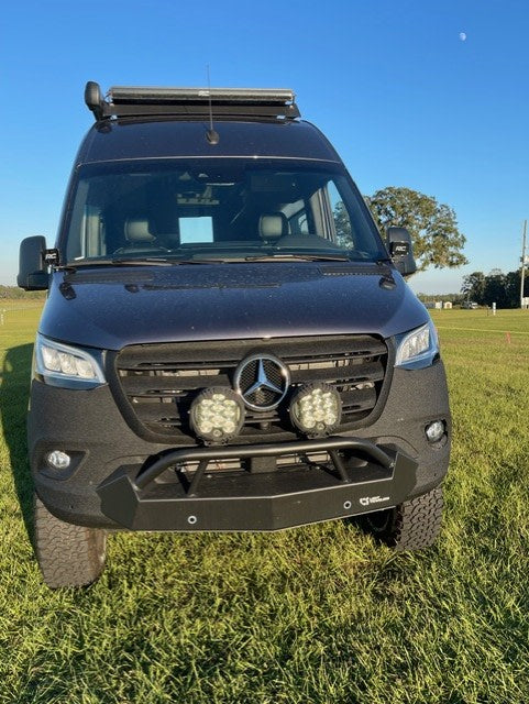 showcasing off-road tires & a roof awning