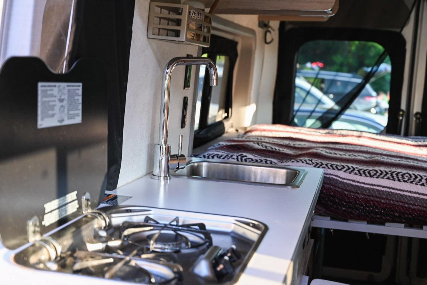 with nature view.|Experience RV rental comfort: interior with dining table