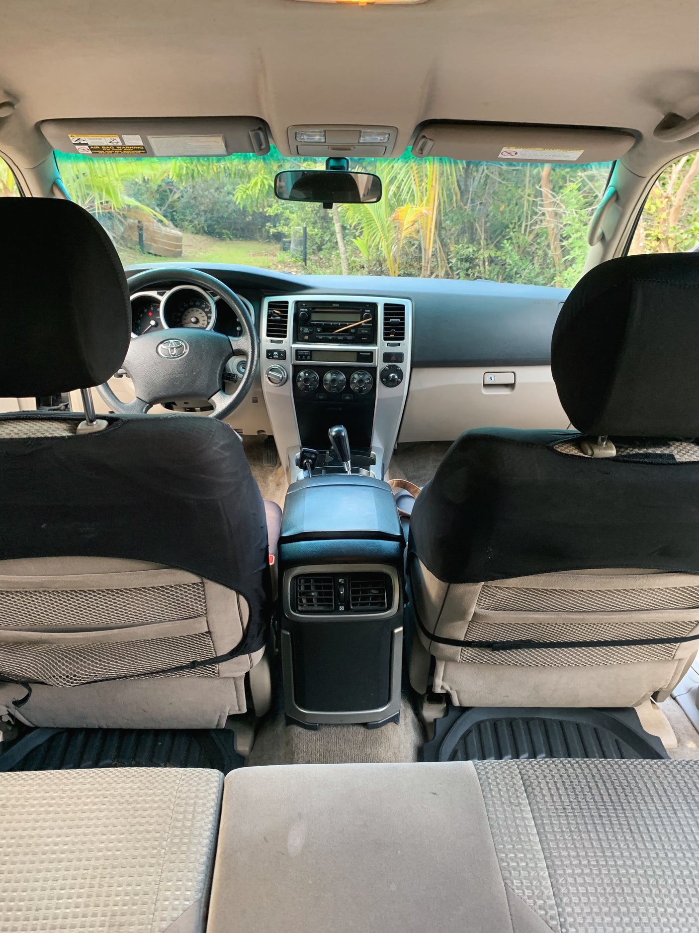 Detailed car interior, dashboard, steering wheel. View from rear seats. Your versatile option for rv rental trips.