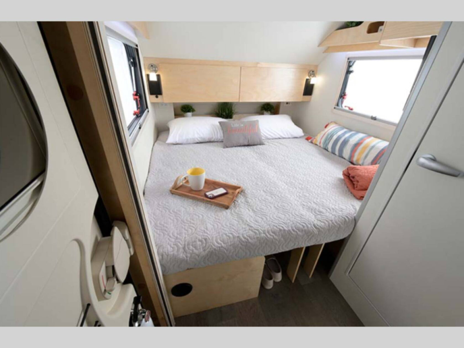and robust hitch system.|RV rental bathroom: compact toilet