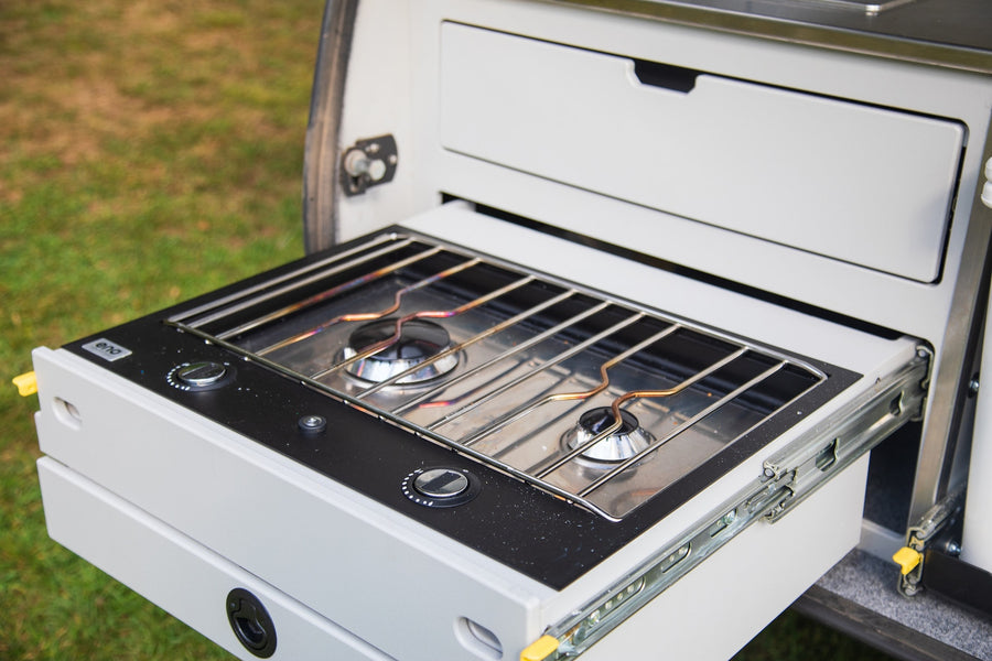 and YETI cooler.|This RV rental reveals a practical pull-out two-burner gas stove with controls