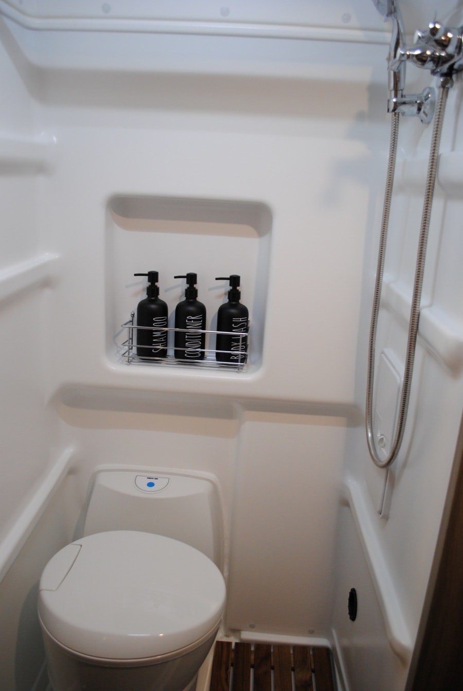 and a bed.|An RV rental kitchen drawer