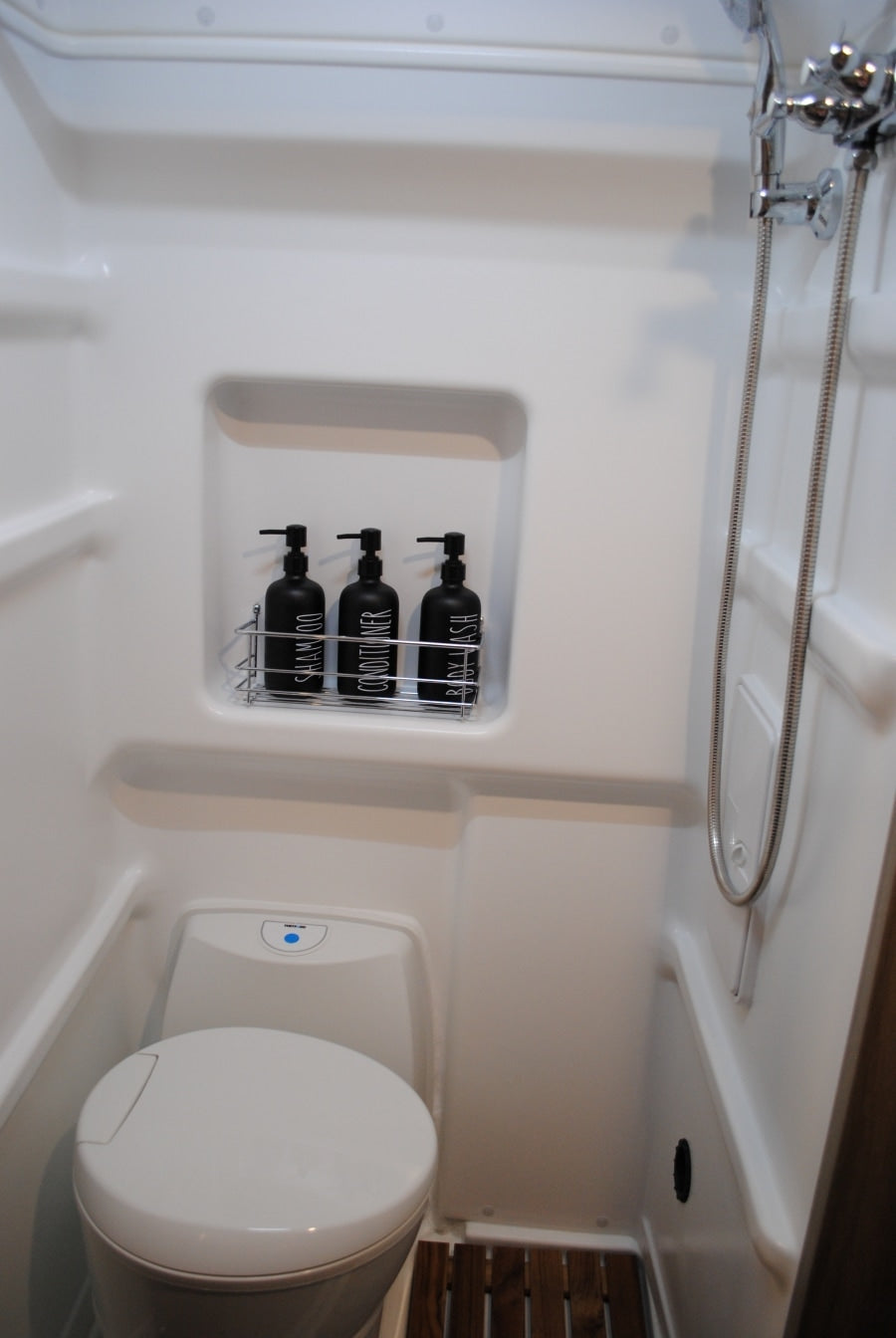 and a bed.|An RV rental kitchen drawer