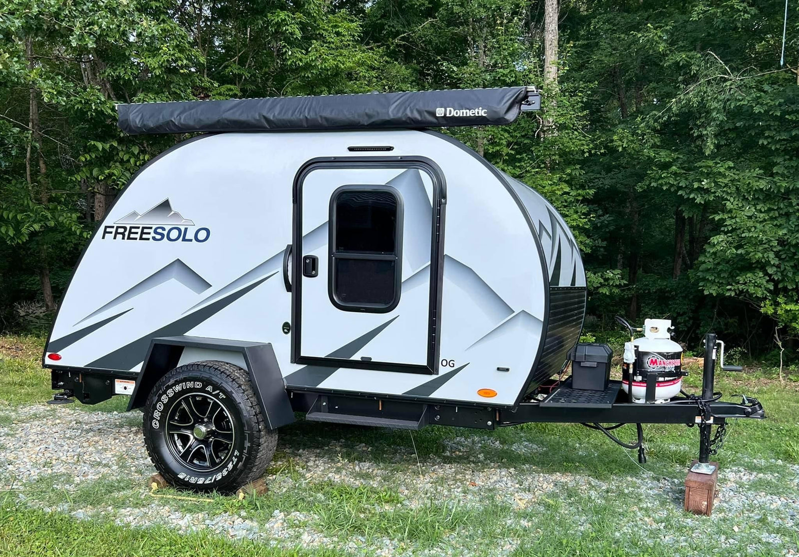 This FreeSolo teardrop trailer with Dometic awning & off-road tires is perfect for an RV rental camping adventure.