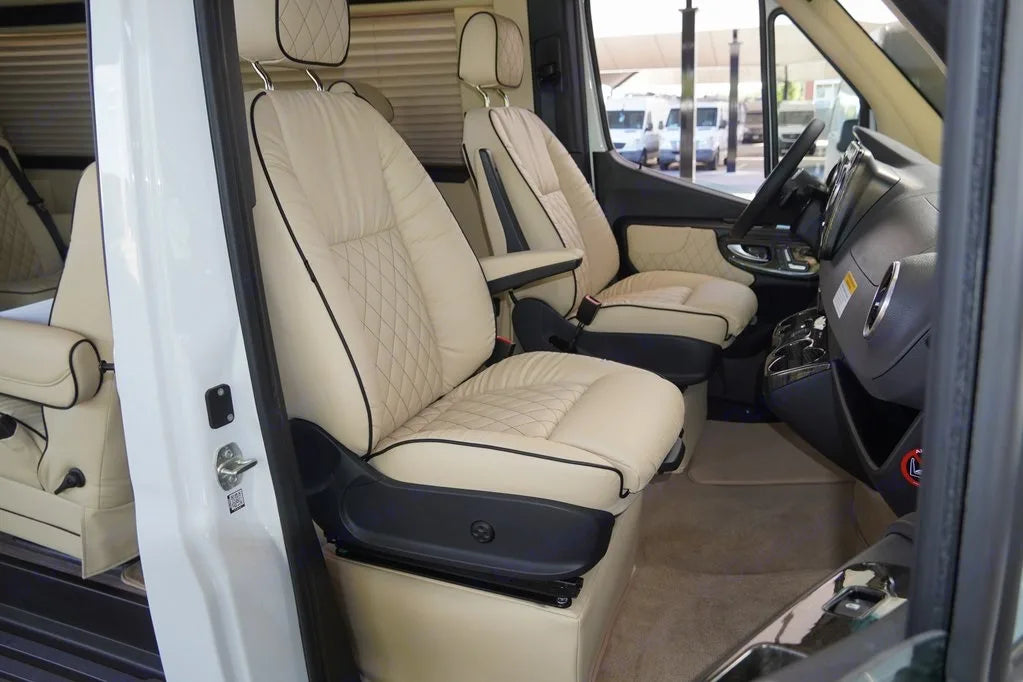 custom cream-colored leather seats with black piping