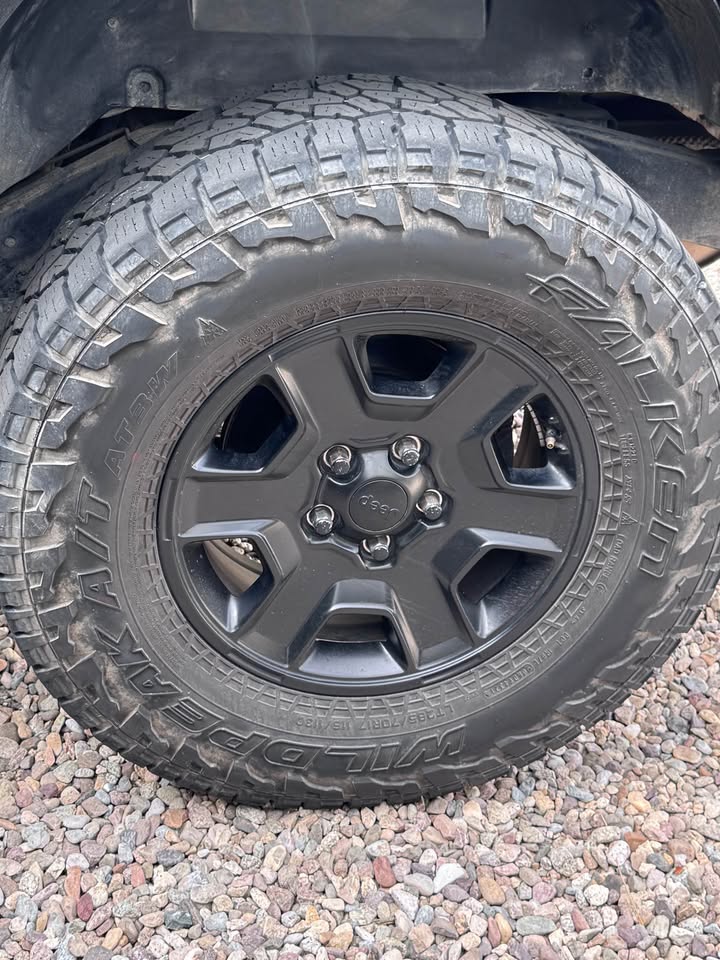 Four Jeep Rims with tires in Tucson, AZ (photo 4)