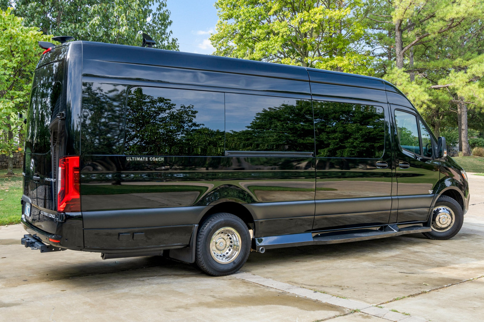 Black Mercedes Sprinter luxury coach for RV rental. Experience stylish travel.