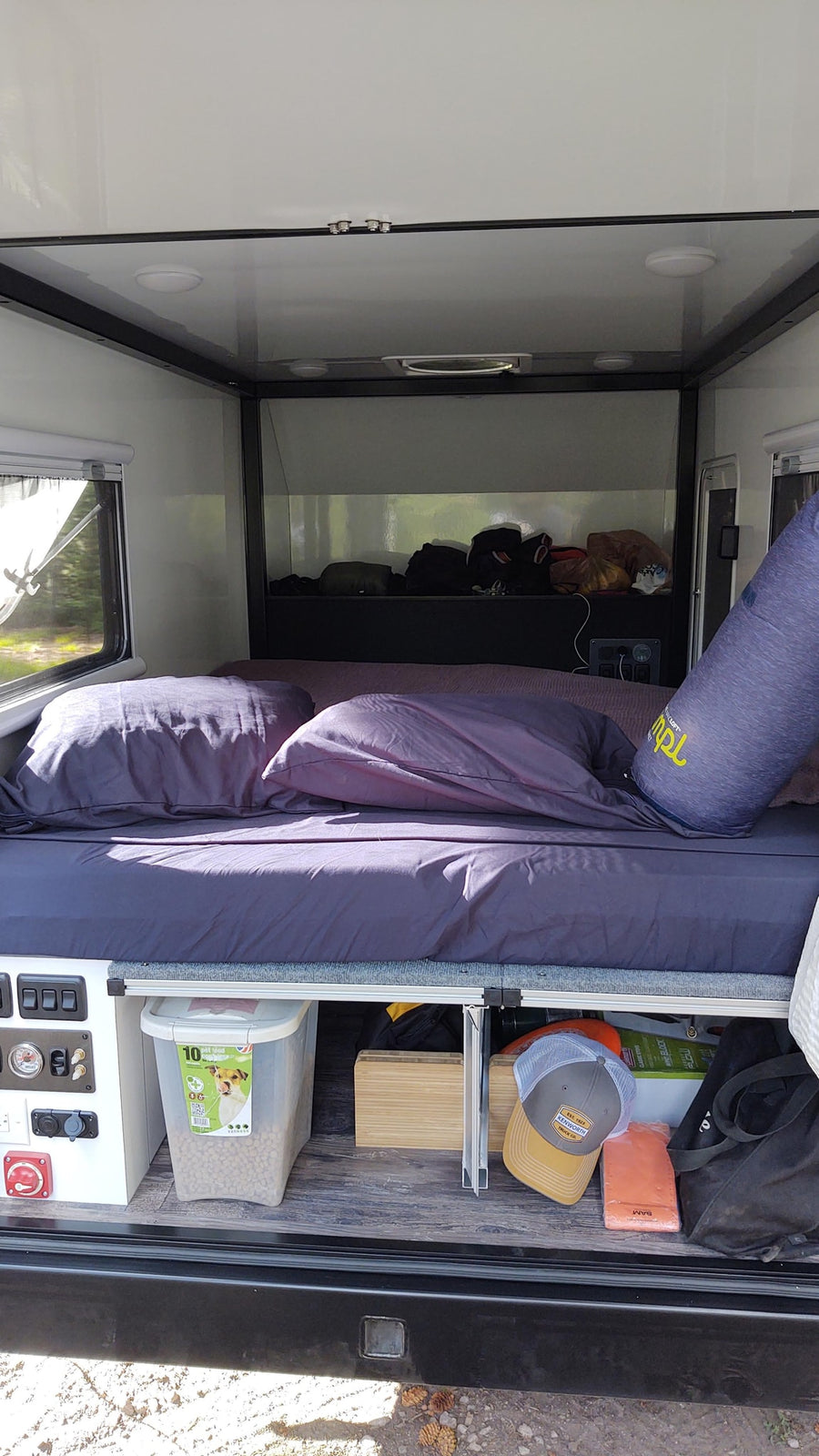 and floor storage.|An RV rental's organized pull-out kitchen