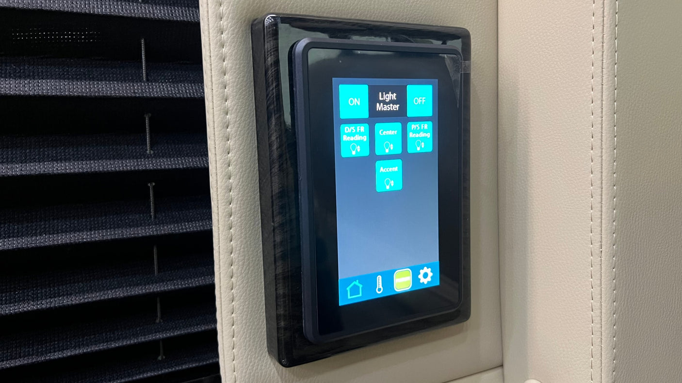This RV rental's interior features a digital touchscreen for light control, managing various zones like reading and accent lights.