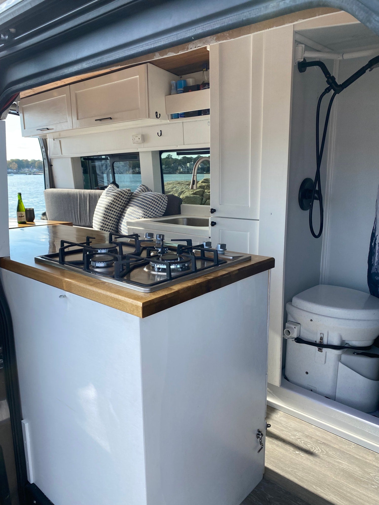 with an open ladder door.|Enjoying breakfast in an RV rental: fried eggs cooking