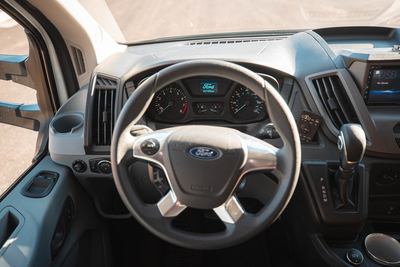 Ford RV rental interior showing dashboard, steering wheel, and controls. Odometer: 47,356 miles.