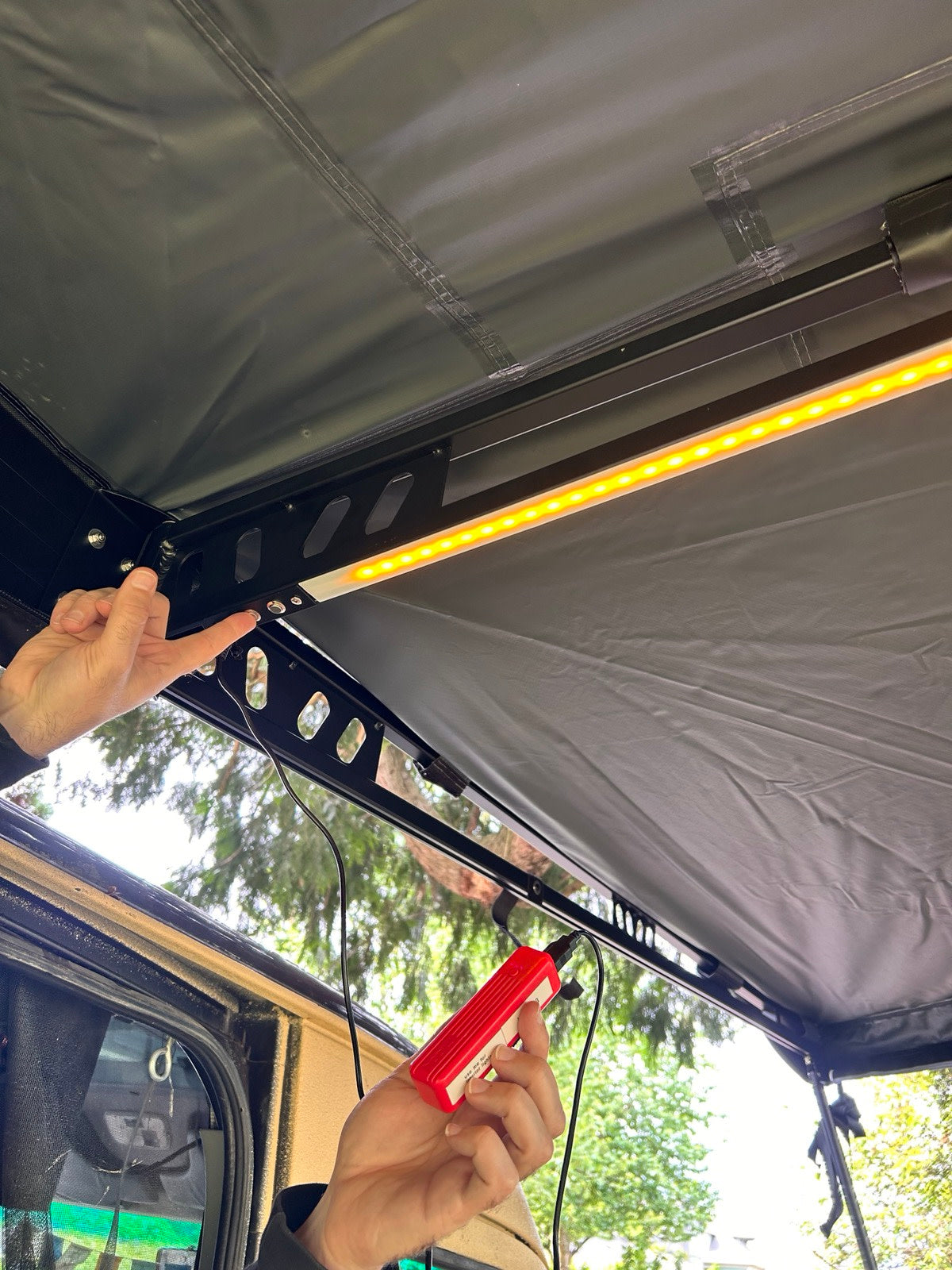 and crate organization.|This cozy RV rental setup features a vibrant bed — photo 9