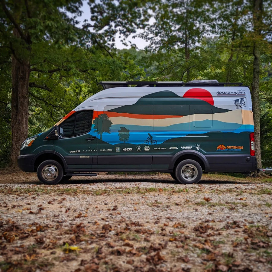This vibrant RV rental van