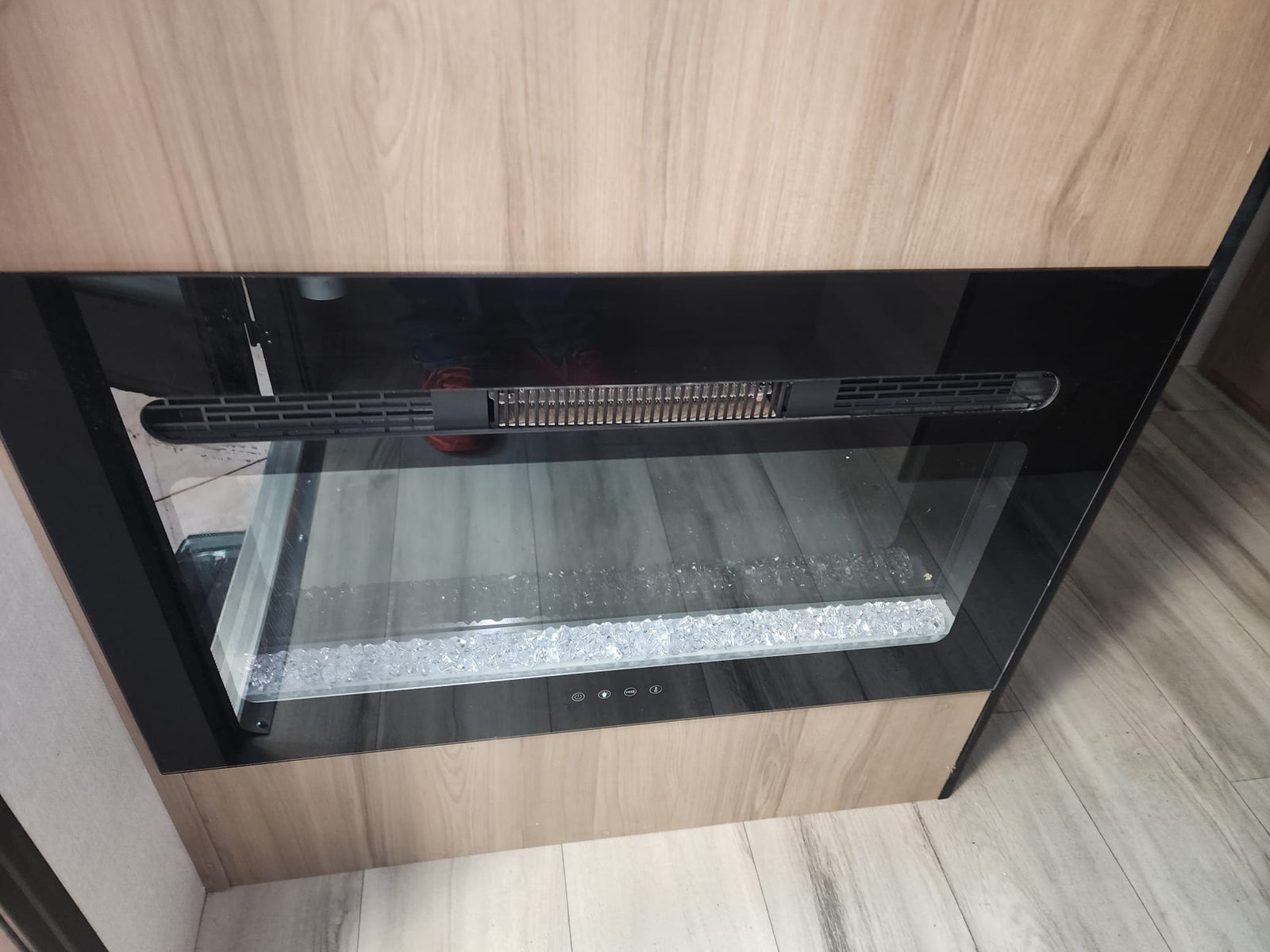 and under-counter fridge.|Interior of an rv rental showing a compact fridge
