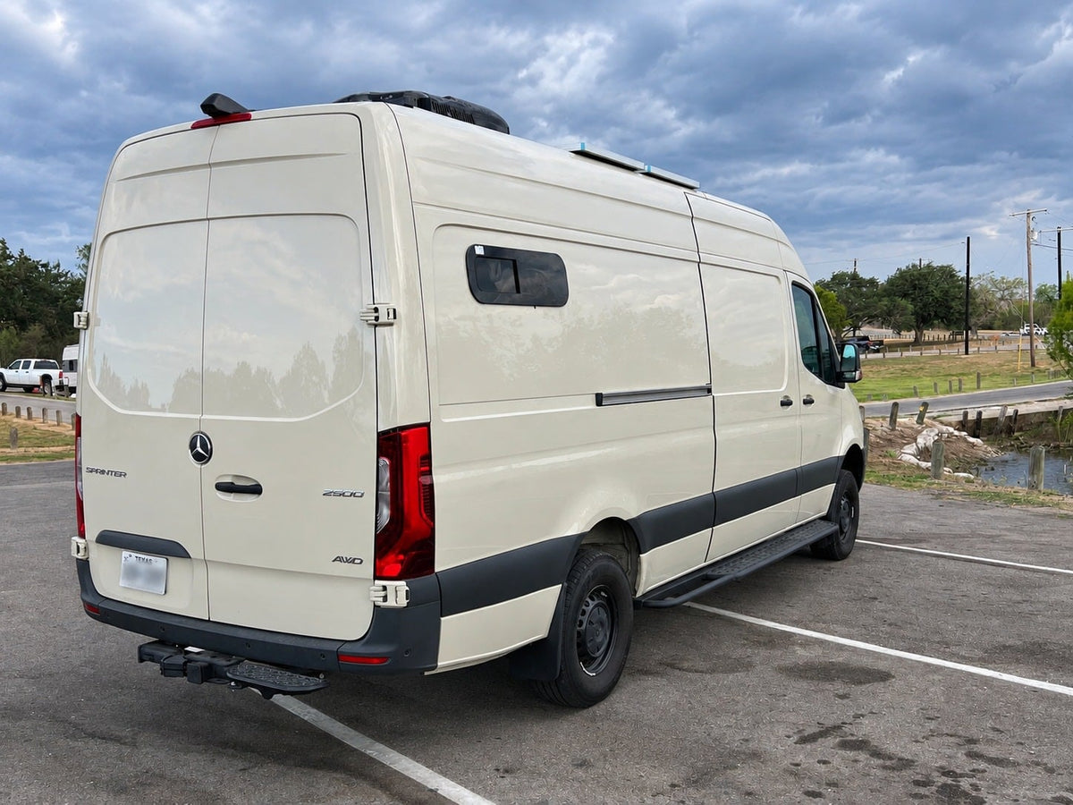 is parked by a lake under a cloudy sky.|Light-colored Mercedes-Benz Sprinter camper van — photo 3