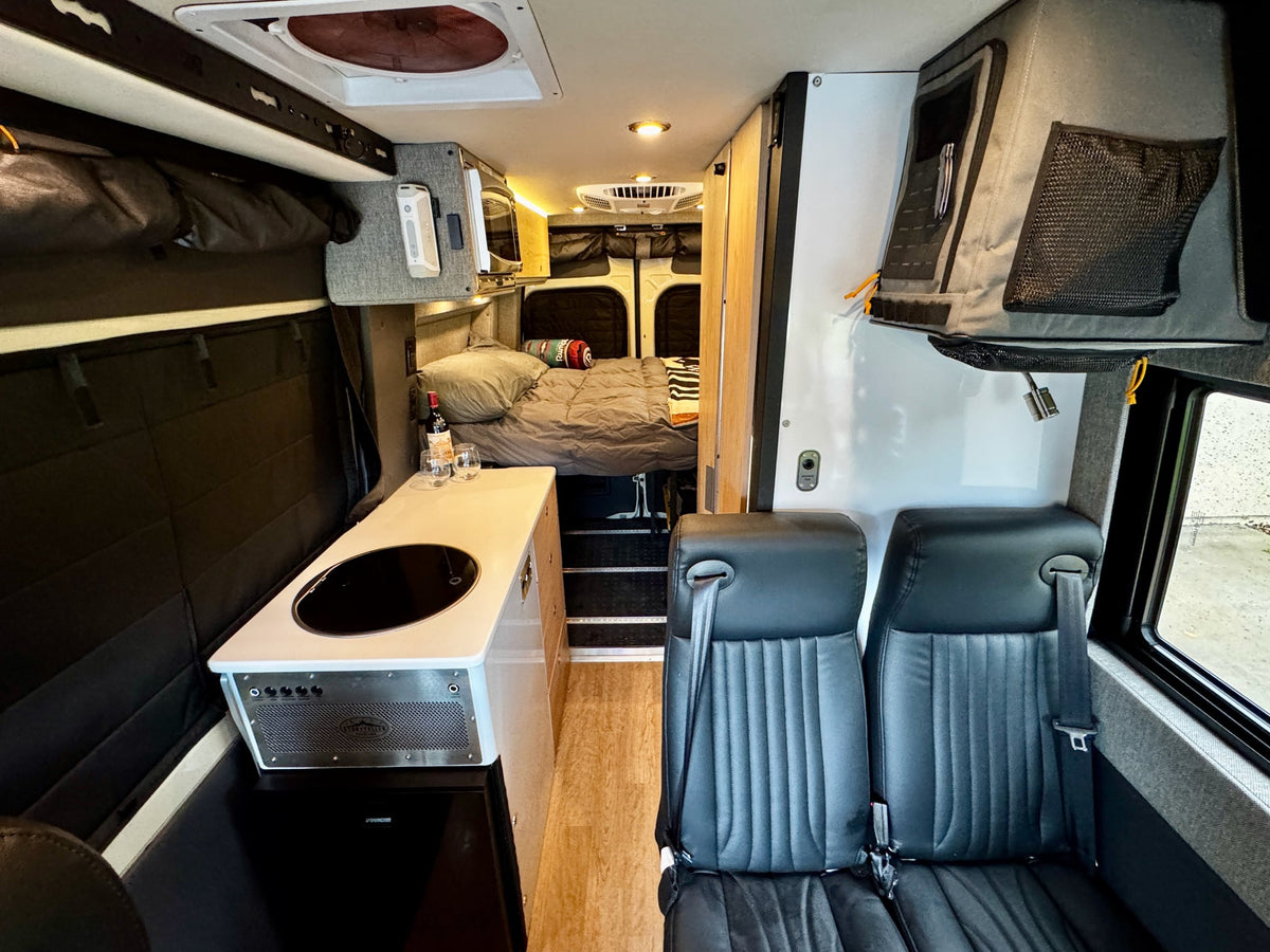 and mobile workstation with laptop setup.|Inside an rv rental — photo 12