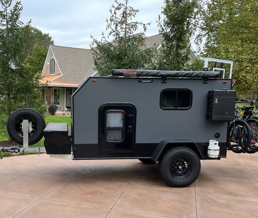 Gray off-road teardrop camper