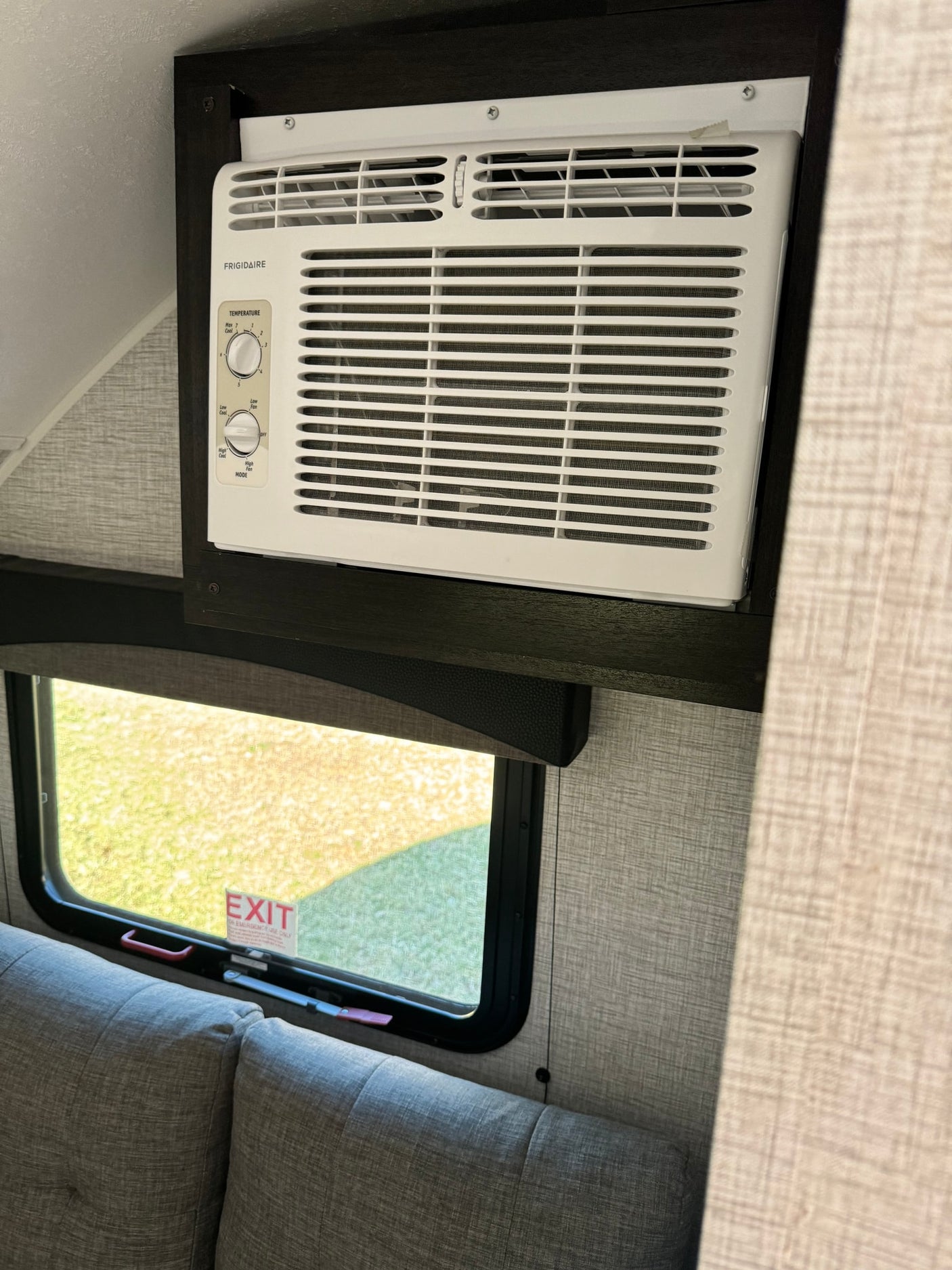 ready for outdoor adventures.|Cozy RV rental dinette with grey upholstered benches