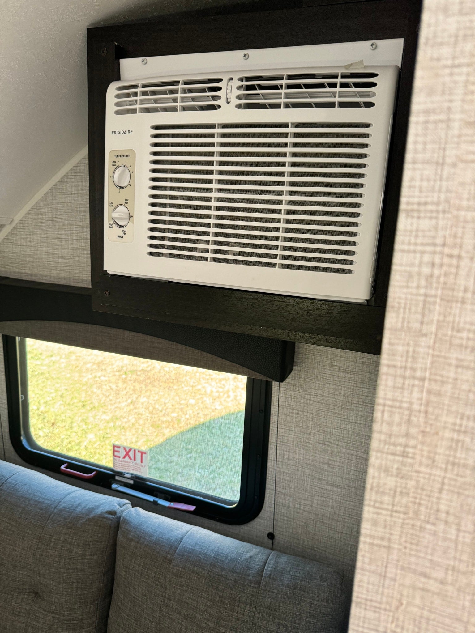 ready for outdoor adventures.|Cozy RV rental dinette with grey upholstered benches