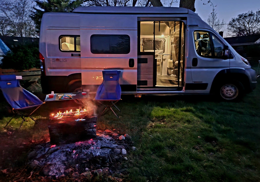 Cozy night by the campfire with an RV rental. Perfect outdoor escape under the stars.