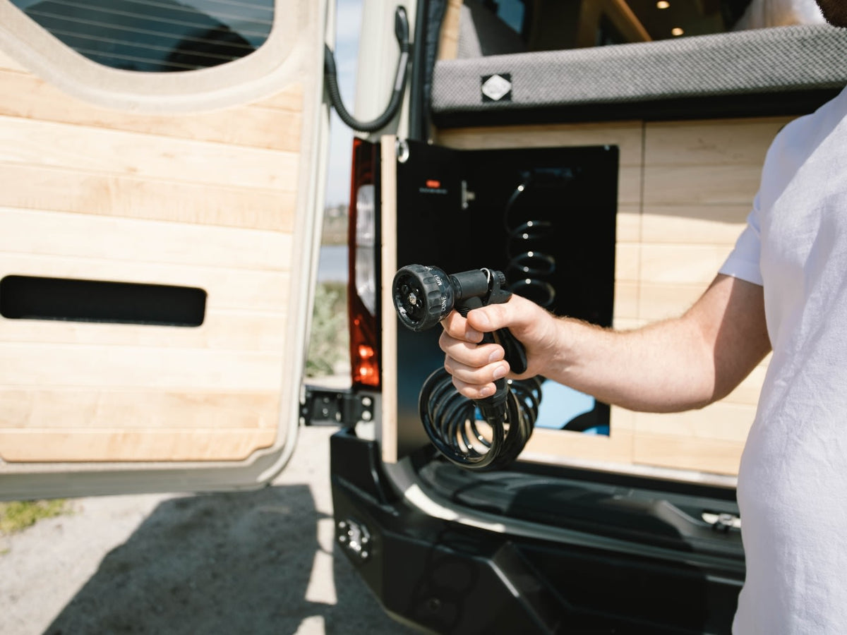 and a scenic view for travel.|Explore an RV rental's rear storage — photo 11