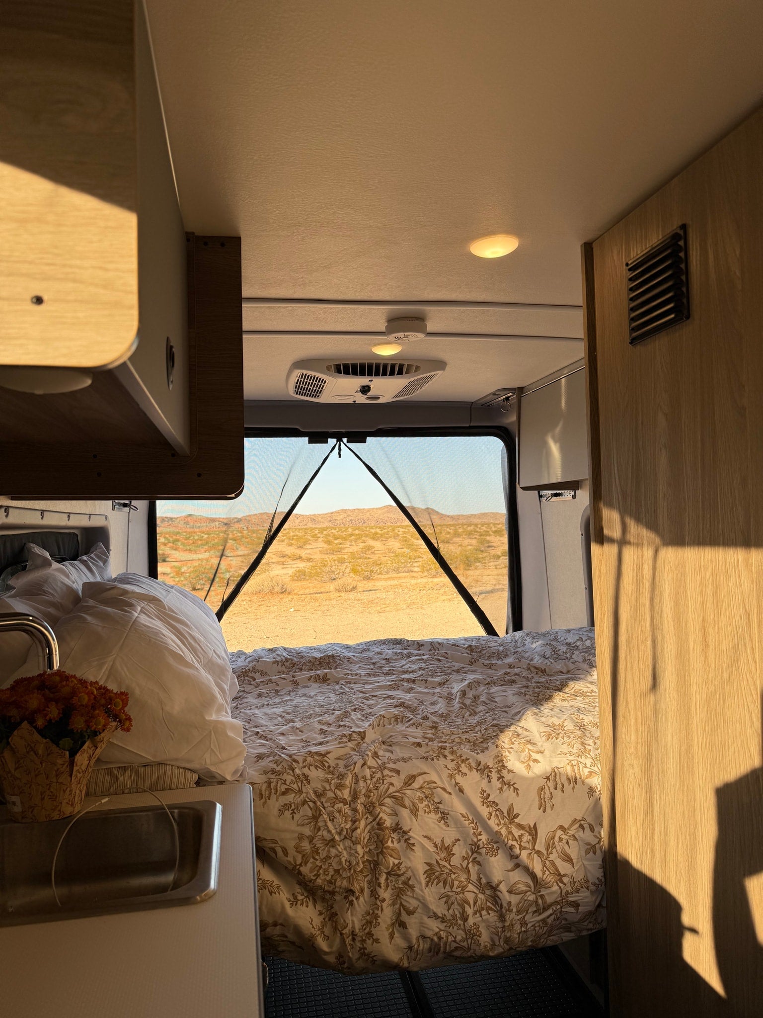 perfect for cooking on an outdoor adventure.|Spacious RV rental interior with comfortable seating