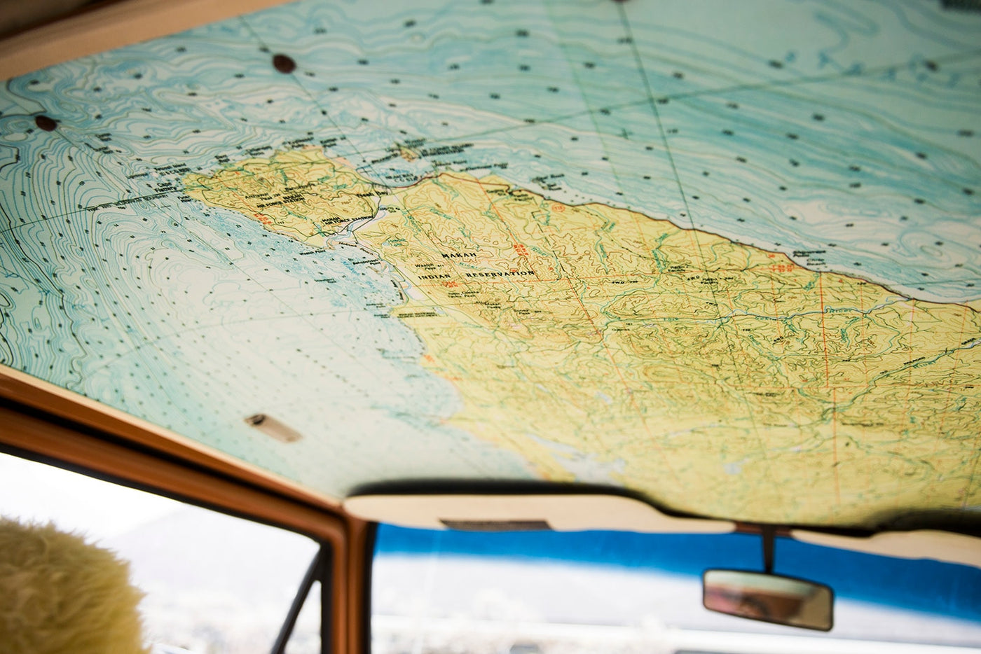 Detailed map of Makah Indian Reservation on an rv rental ceiling, perfect for road trip navigation. View from inside vehicle. — photo 7