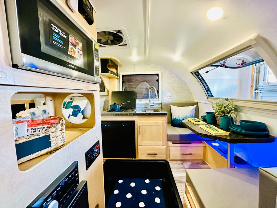 Explore this cozy RV rental interior