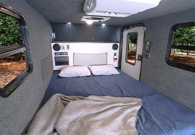 ready for adventure.|Spacious RV rental bedroom with comfortable bed