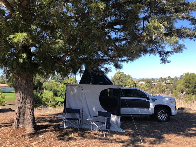 ideal for an RV rental outdoor adventure.|RV rental truck camping setup: rooftop tent