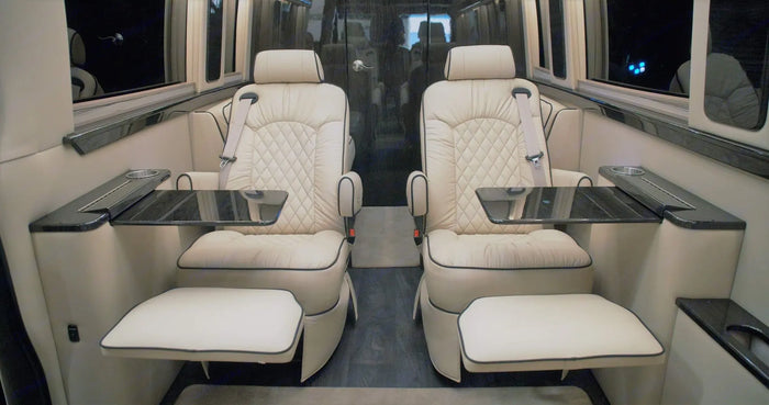 spacious tan leather RV rental interior with comfortable seating