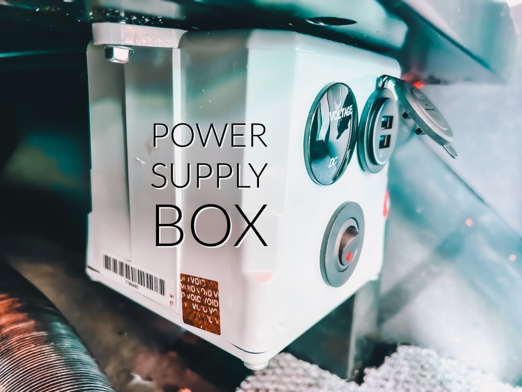 RV rental power supply box with voltage gauge & USB ports. Provides essential vehicle power.