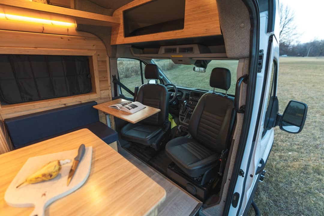 is perfect for your next RV rental road trip.|This RV rental showcases a well-appointed interior with a compact kitchen