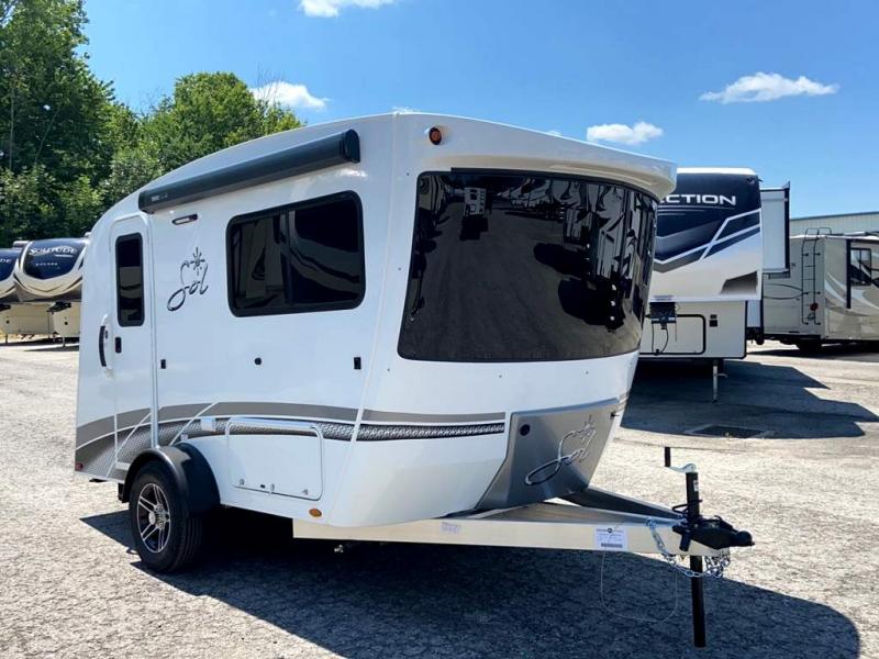 This sleek white Sol travel trailer