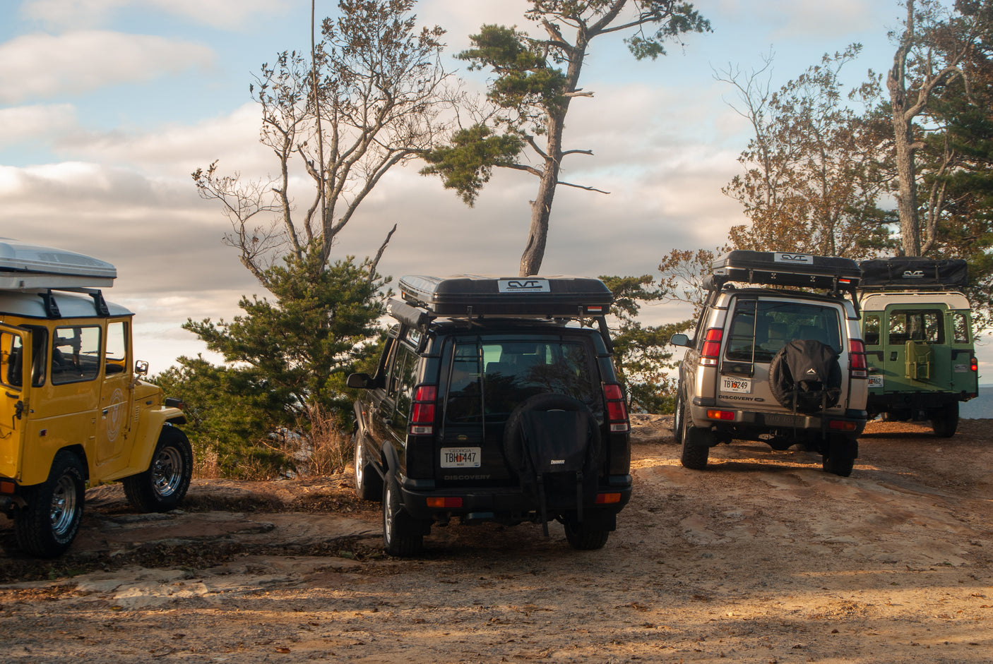 perfect for RV rental adventures. Parked on grass at sunset