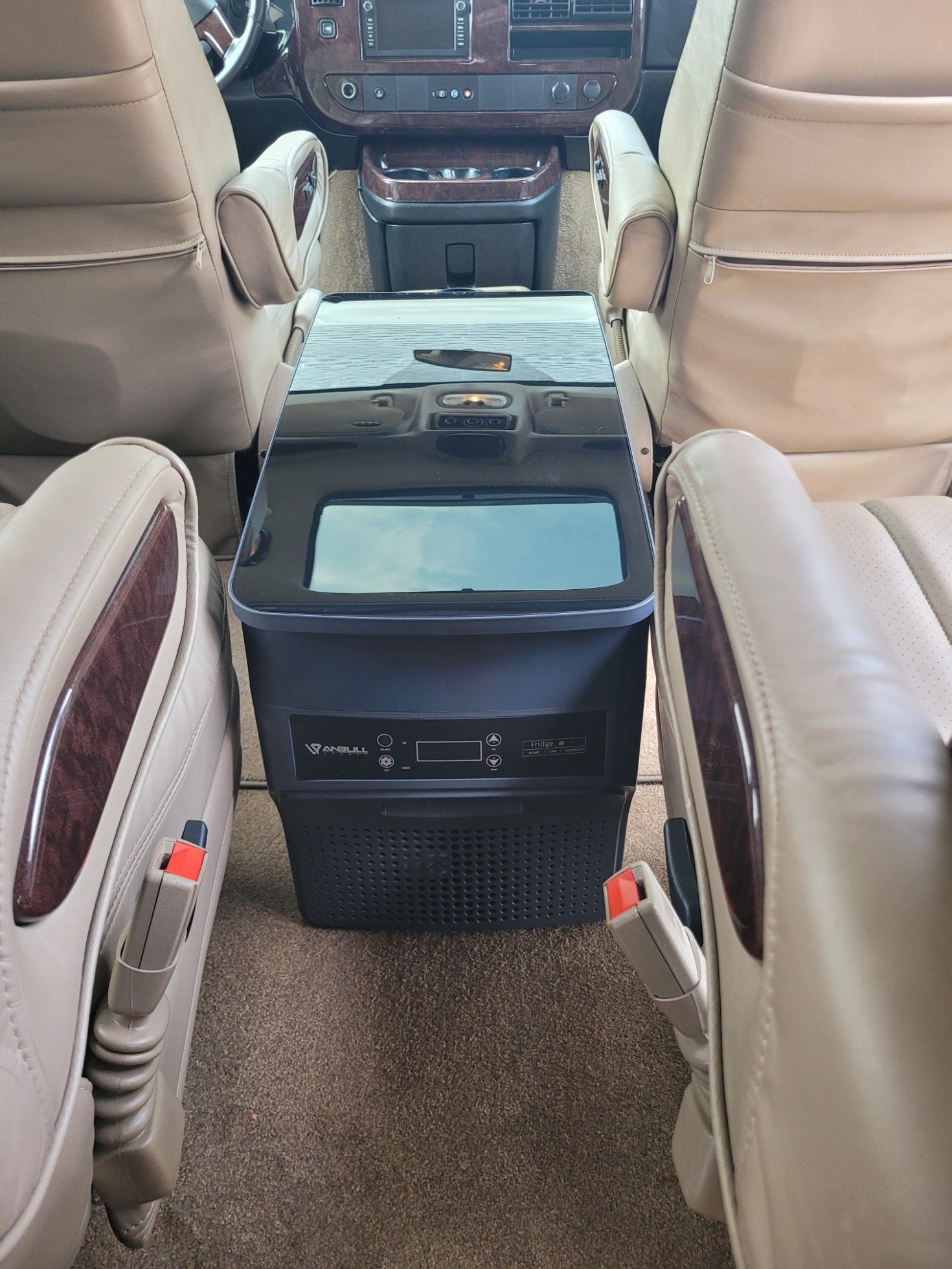 and comfortable amenities for travel.|RV rental interior: light leather seats