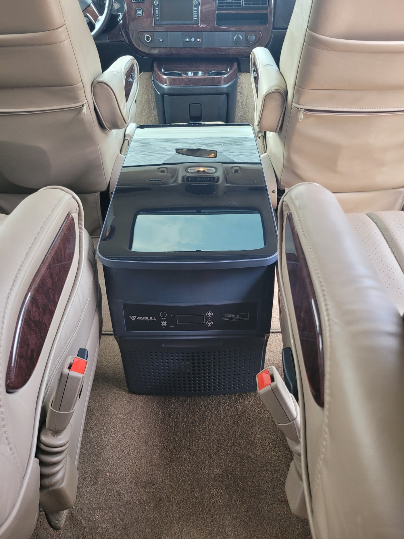 and comfortable amenities for travel.|RV rental interior: light leather seats