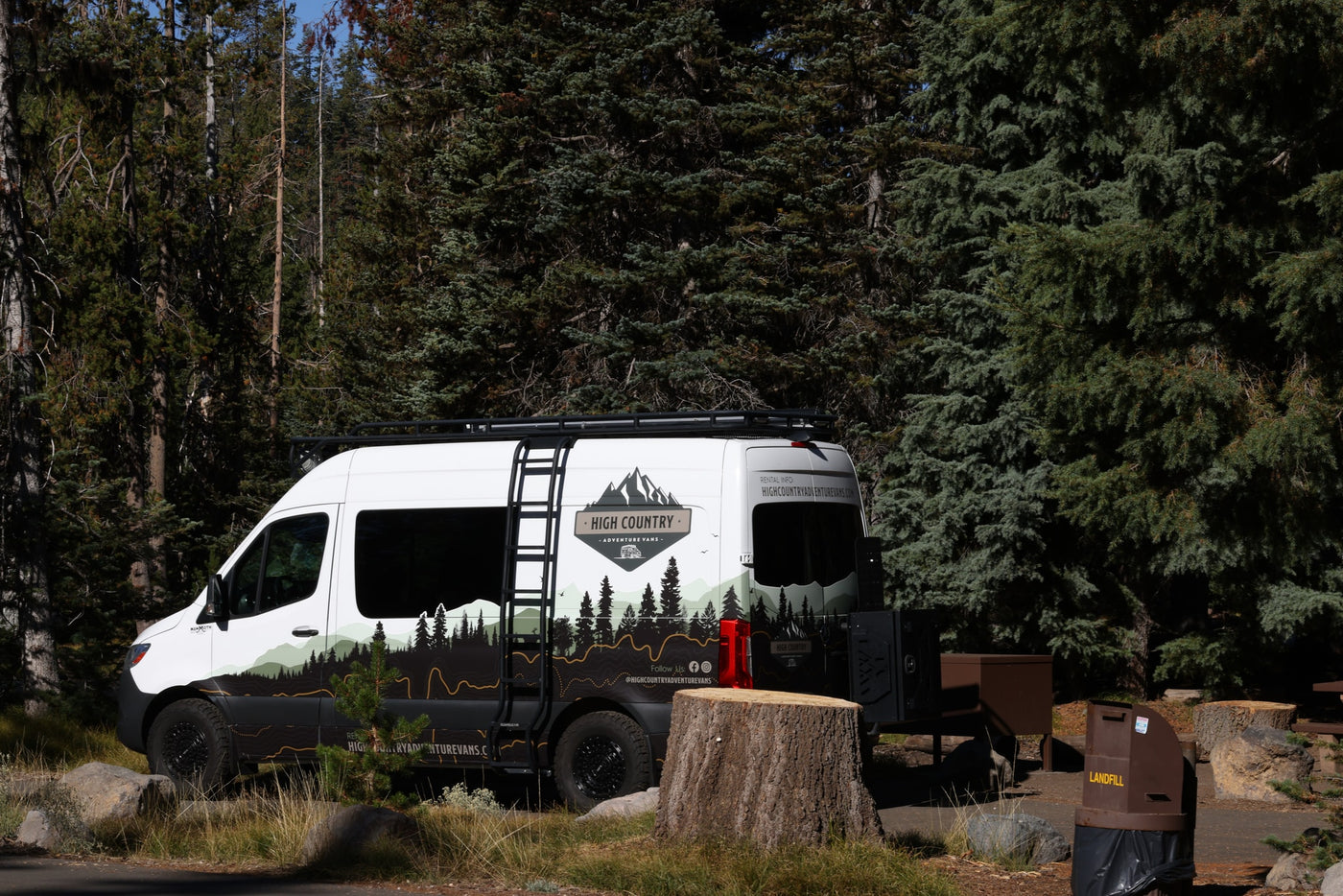 High Country RV rental camper van at a forest campsite. Ready for outdoor adventure and nature exploration. — photo 8