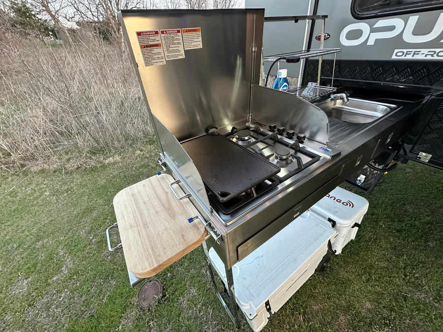 featuring an outdoor kitchen