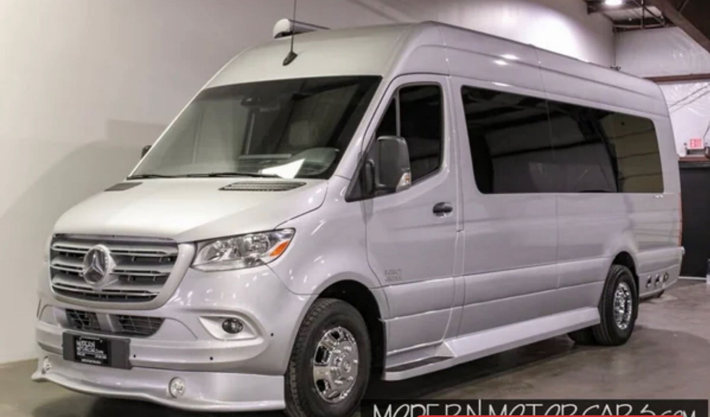 A silver Mercedes-Benz Sprinter van, converted for RV rental. High-roof, tinted windows, and custom wheels for travel. — photo 1