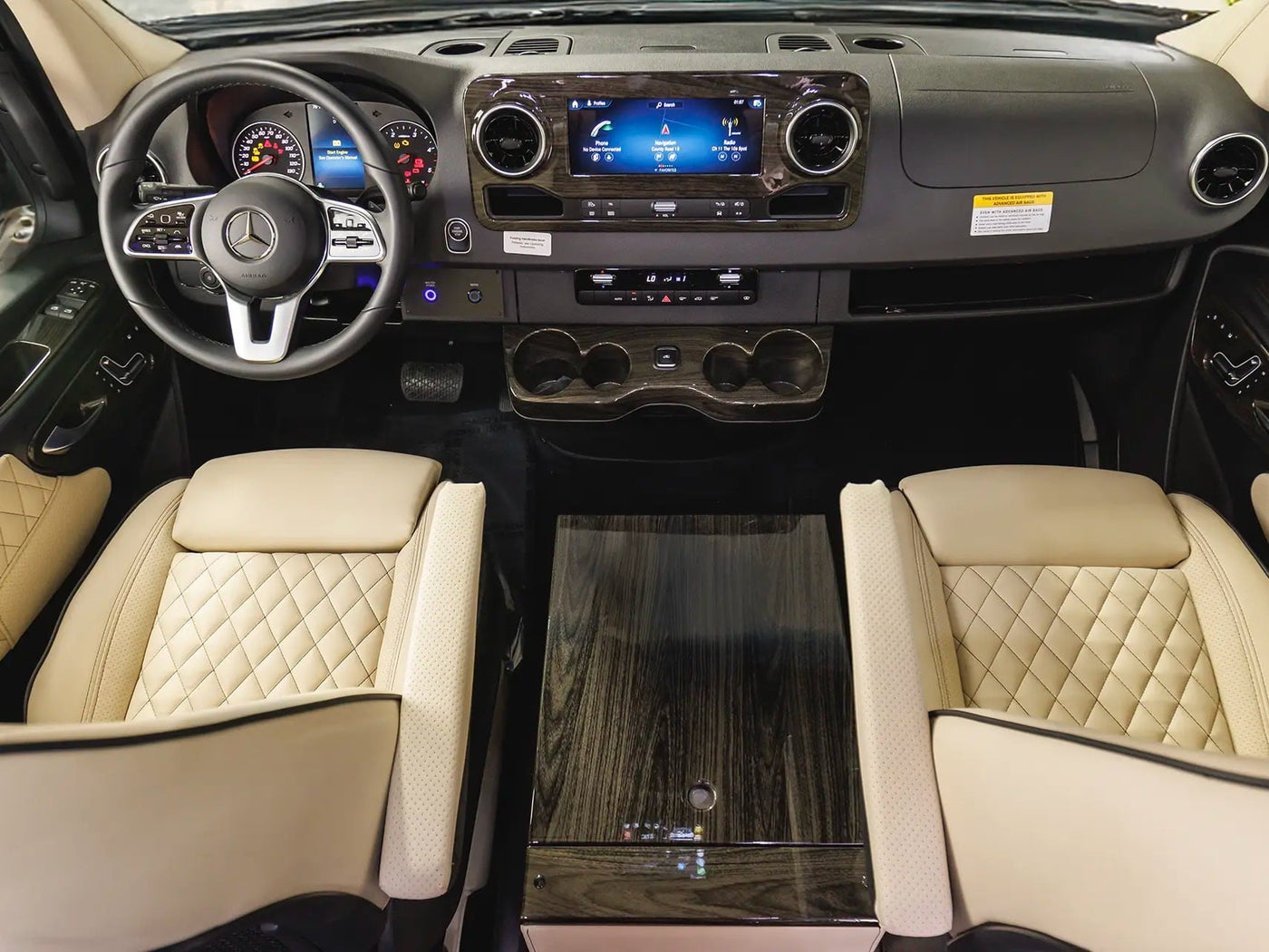 ideal for your next RV rental. Parked outdoors on a sunny day.|Luxury RV rental interior with a Mercedes-Benz dashboard — photo 5