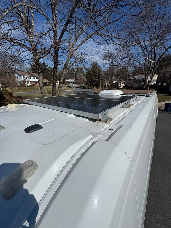 and a brilliant blue sky.|Explore this modern RV rental camper van conversion
