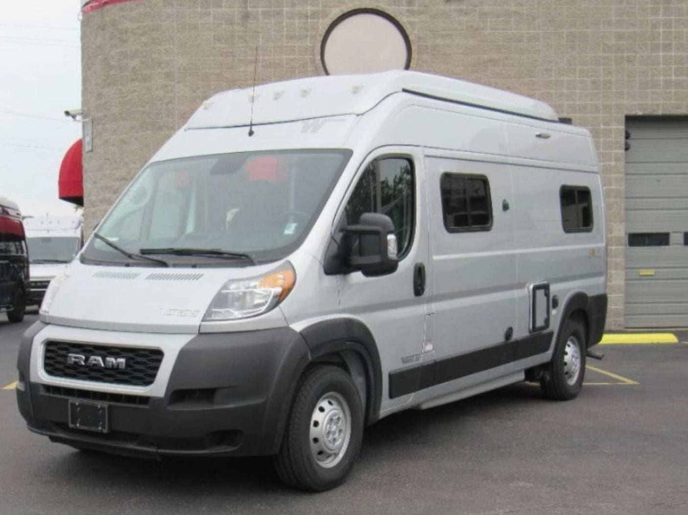 and grey plaid bedding & black privacy shades. Perfect for a road trip.|Cozy plaid bed in this RV rental