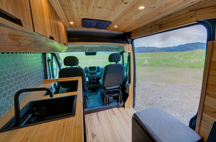 in nature.|Inside a stylish RV rental: light wood interior