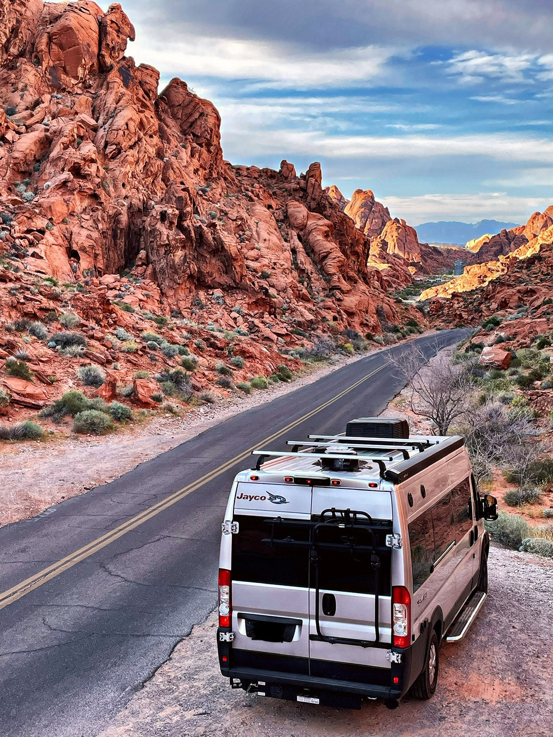surrounded by stunning red rock canyons under a blue sky