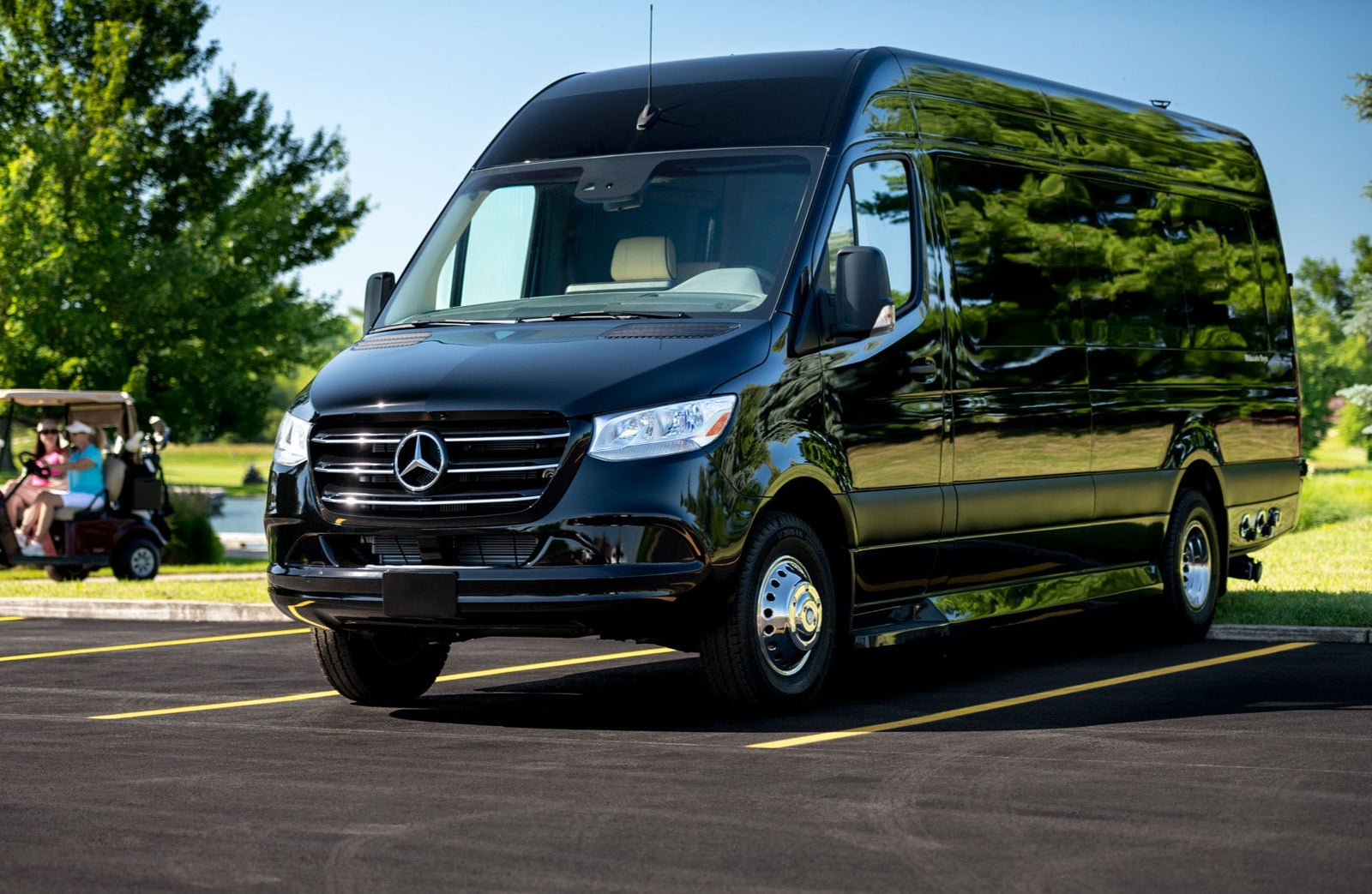 Sleek black Mercedes-Benz Sprinter luxury van