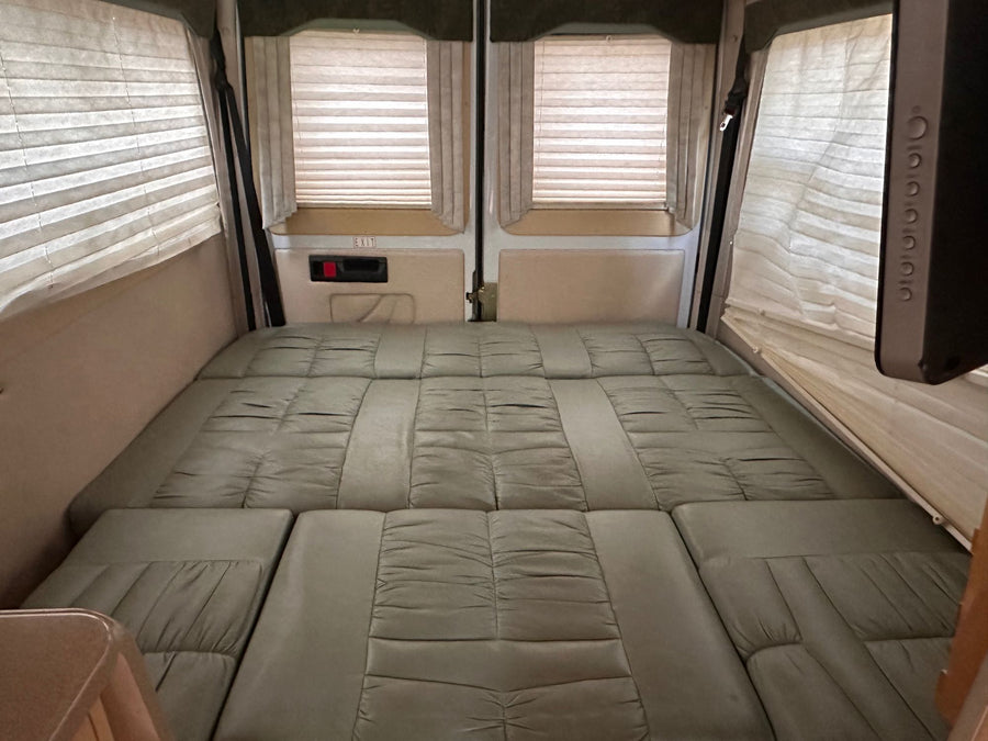 ideal for your next RV rental adventure.|Step into this cozy RV rental's kitchen