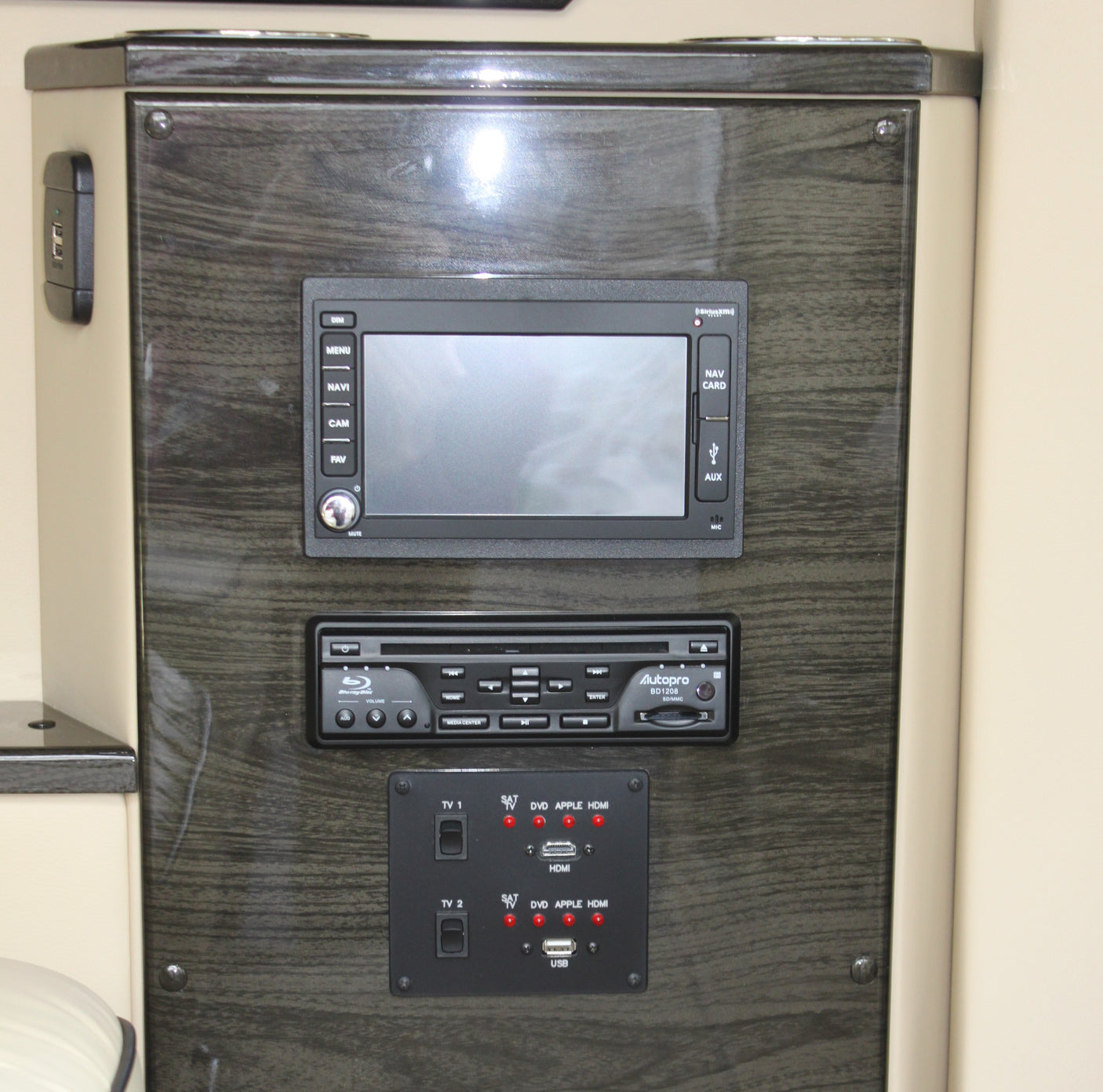 RV rental entertainment & navigation control panel, featuring a Blu-ray player, USB, and HDMI inputs for media.